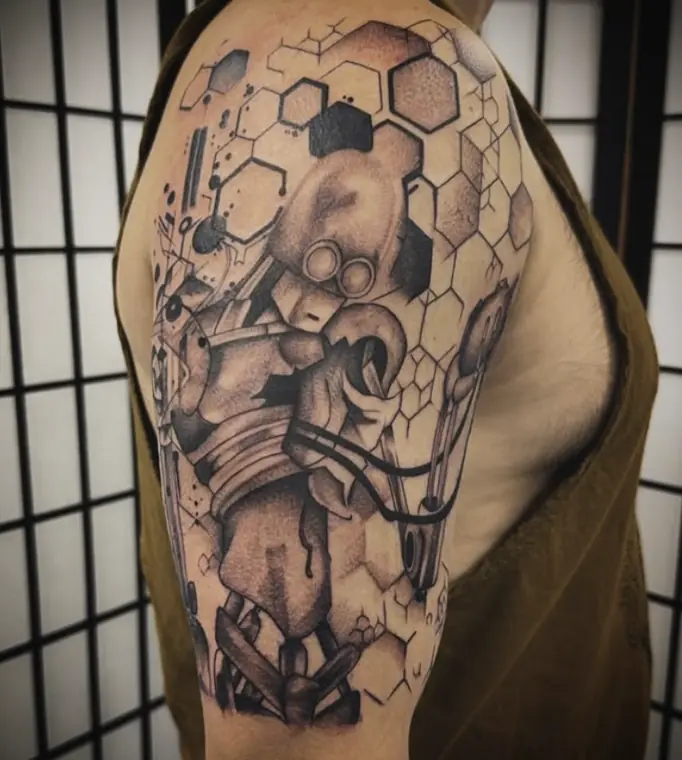 An illustrative character over a honeycomb pattern on the upper arm.